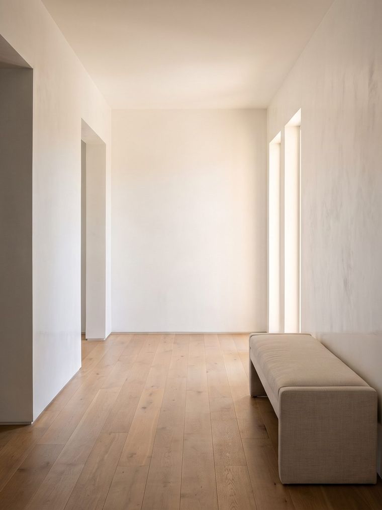 Hallway with smooth, polished white Diamond Plaster walls