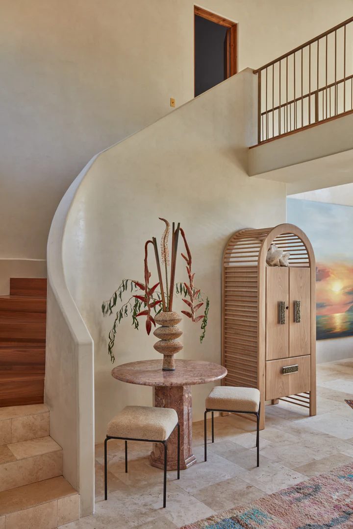 Roman clay plaster wall along a curved staircase