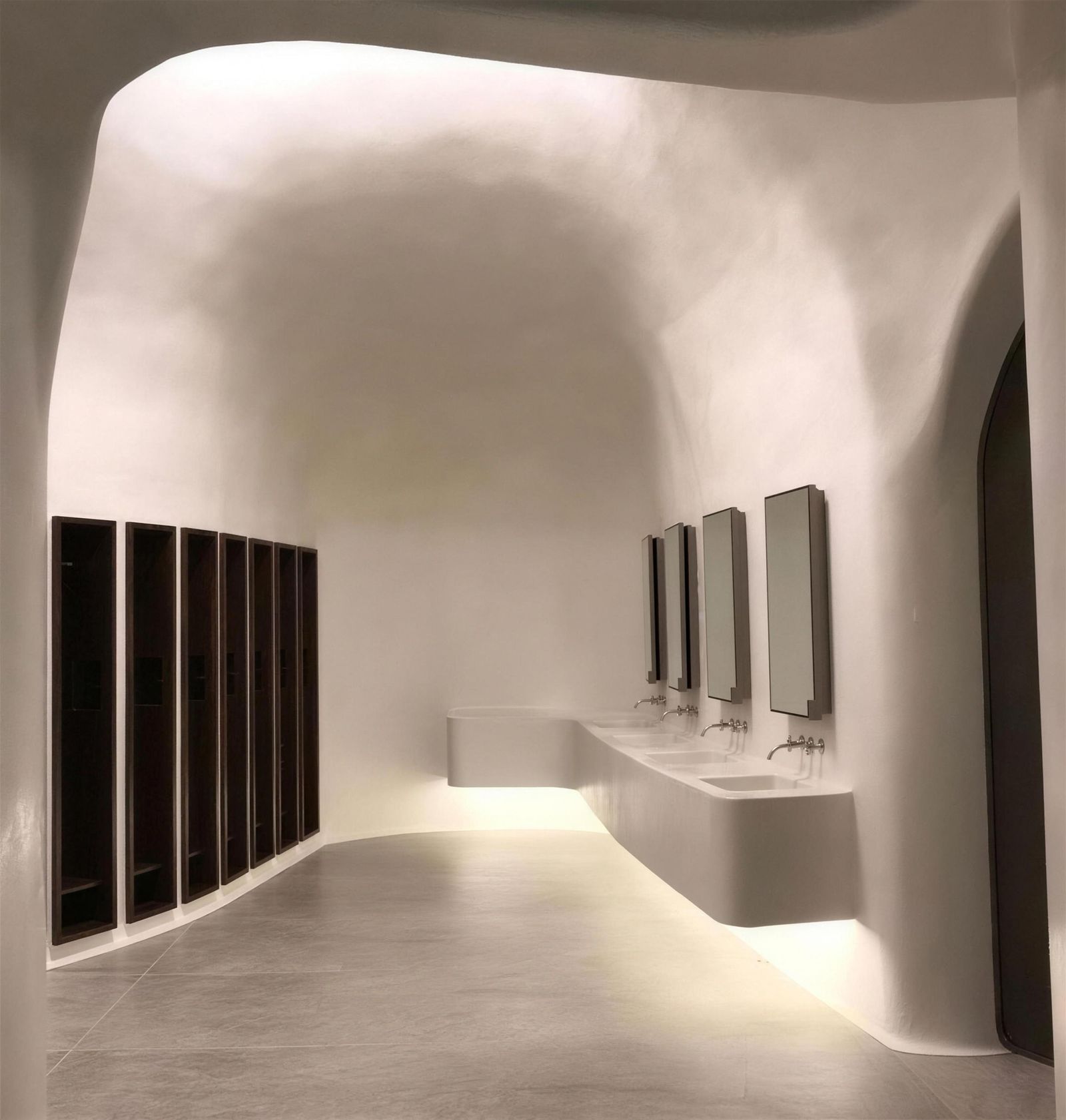 Sculptural curved plaster interior lit from above