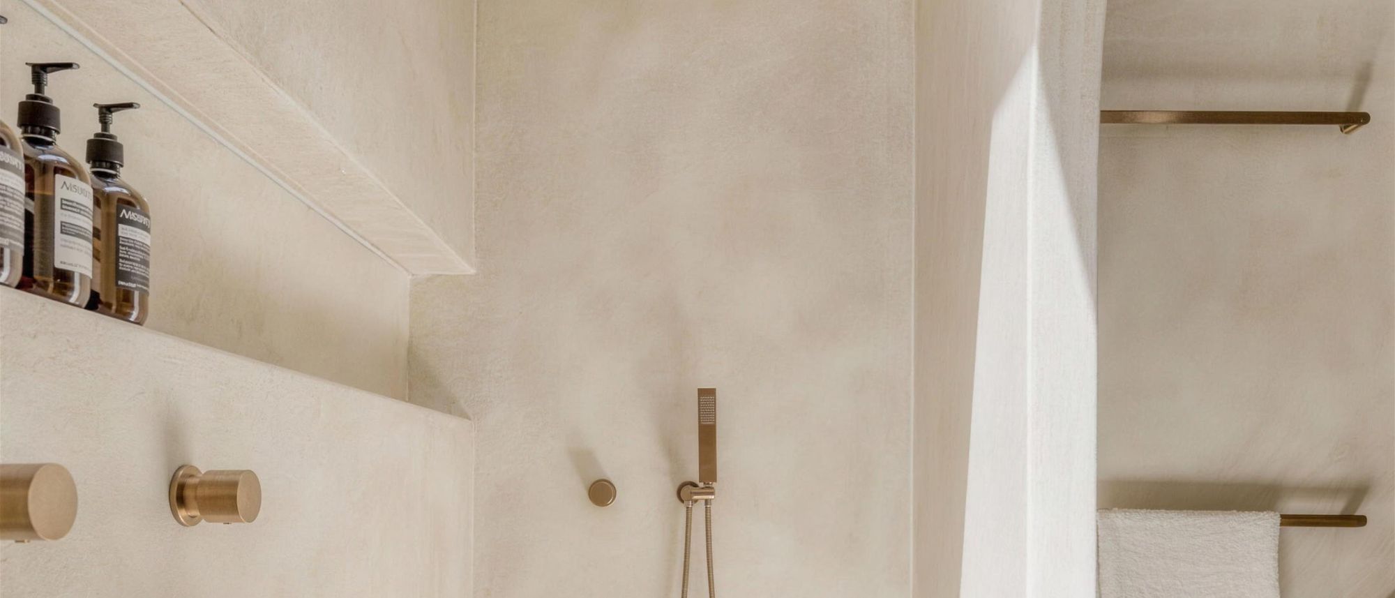 Polished Venetian plaster wall with a soft, stone-like sheen in an Austin interior